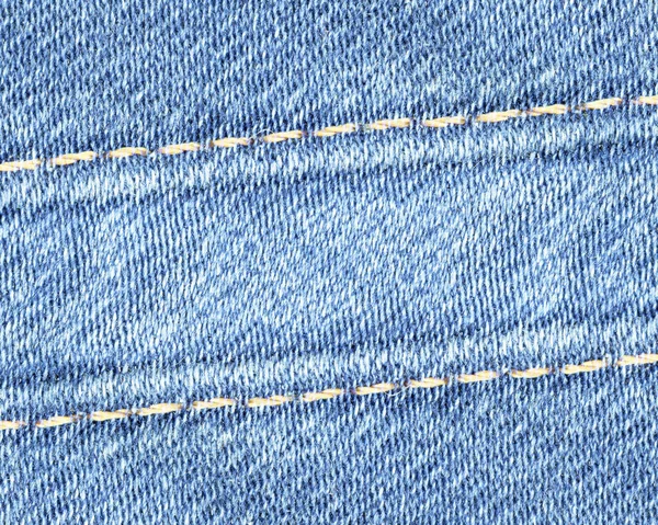 Blå denim bakgrund, sömmar. Användbar för design-verk — Stockfoto