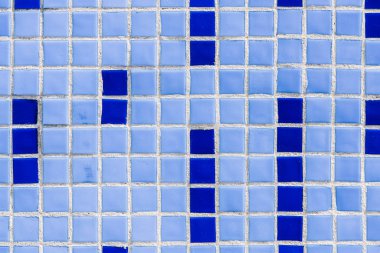 full frame image of wall with blue ceramic tiles background clipart
