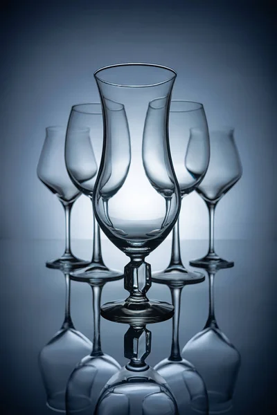 Silhouettes Different Empty Wine Glasses Reflections Grey — Stock Photo, Image