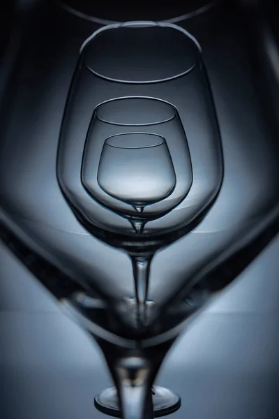 Row Empty Transparent Wine Glasses Grey — Free Stock Photo