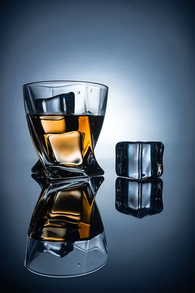 Glass Cognac Ice Cubes Reflections Dark Grey Background — Stock Photo, Image