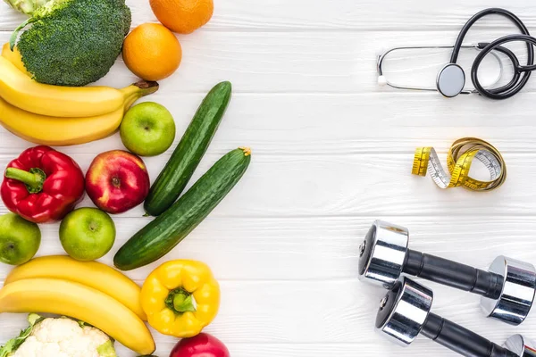 Top View Fresh Fruits Vegetables Dumbbells Stethoscope Measuring Tape Wooden — Stock Photo, Image