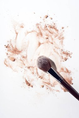 Make up powder and makeup brush on white background clipart