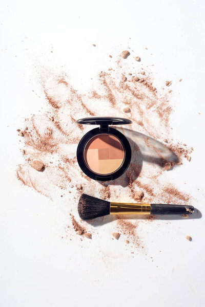 Contouring palette with brush on white background