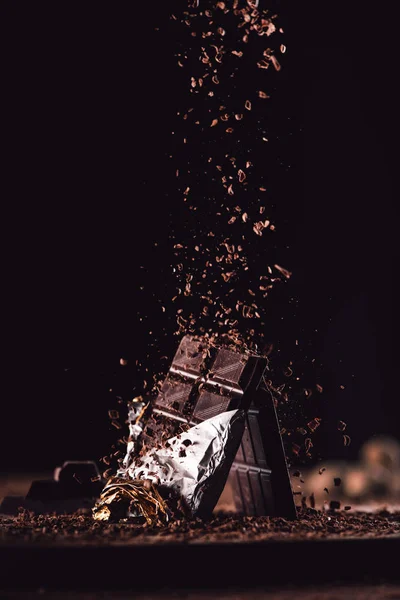 Close Image Grated Chocolate Falling Two Chocolate Bars Wooden Table — Stock Photo, Image