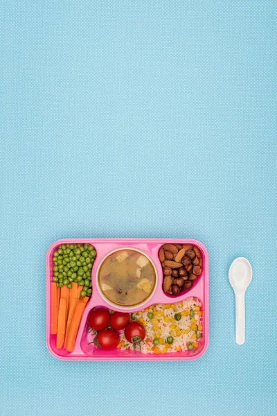 Top view of tray with kids lunch for school and spoon isolated on blue — Stock Image Top View Tray Kids Lunch School Spoon Isolated Blue Stock Photo