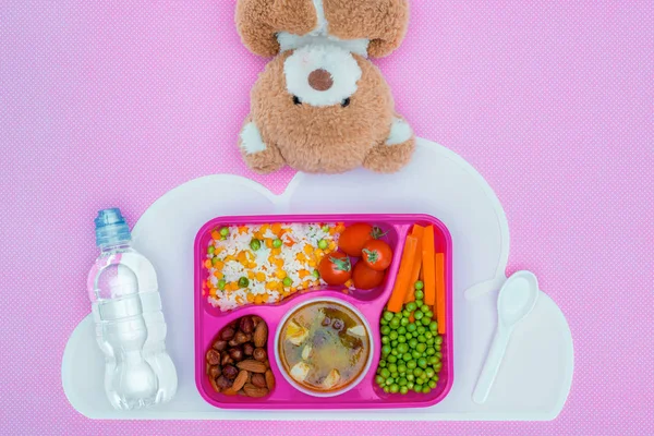 Top view of tray with kids lunch for school and teddy bear on violet surface — Stock Image Top View Tray Kids Lunch School Teddy Bear Violet Surface Stock Photo