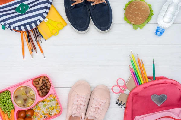 Top View Tray Kids Lunch School Bags Shoes White Table — Stock Photo, Image