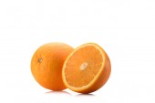 close up view of piece of orange and wholesome fruit isolated on white