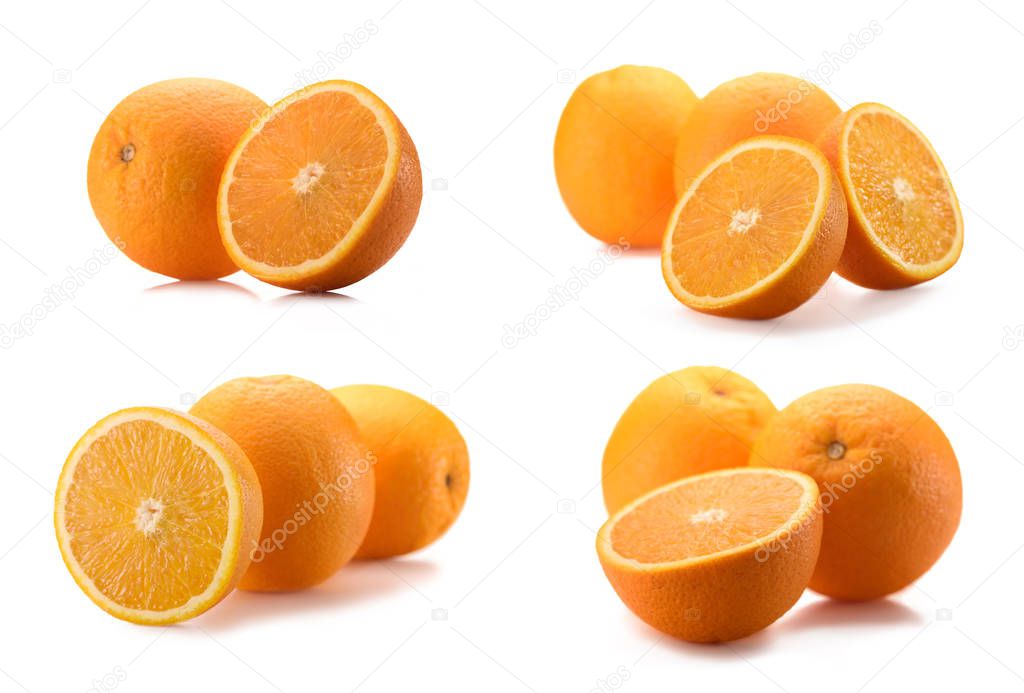 close up view of wholesome and cut oranges isolated on white