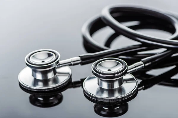 Selective Focus Two Stethoscopes Glass Surface — Stock Photo, Image