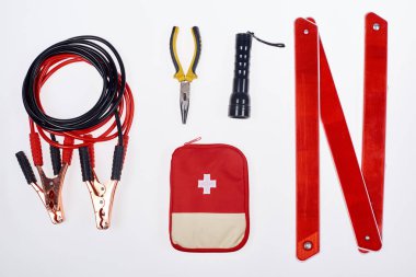 flat lay with first aid kit and automotive accessories isolated on white clipart