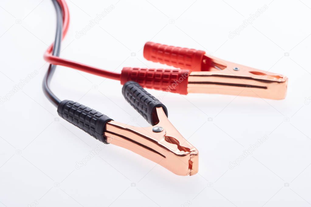 close up view of jump start cables isolated on white