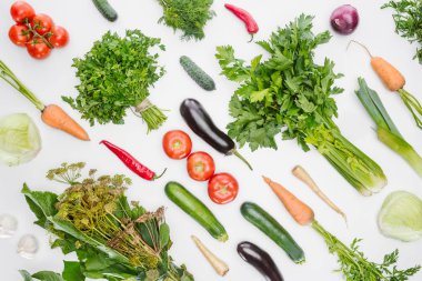 full frame of fresh autumn vegetables arranged isolated on white clipart