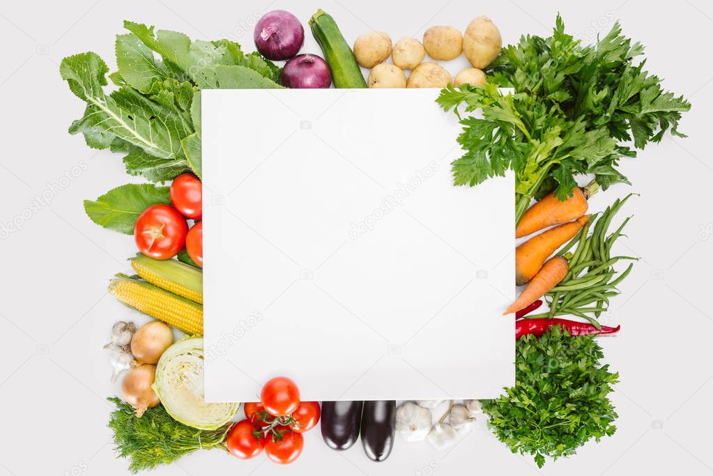 top view of food composition with fall harvest with blank space in middle isolated on white