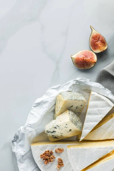 Flat Lay Assorted Cheese Fig Pieces White Marble Surface — Stock Photo, Image
