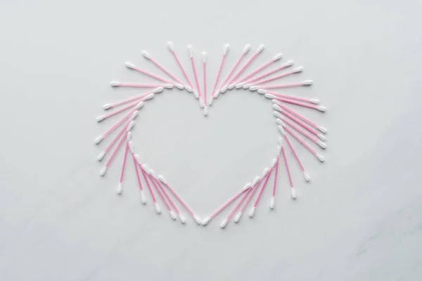 Top View Cotton Swabs Shape Heart White Surface Beauty Concept — Free Stock Photo