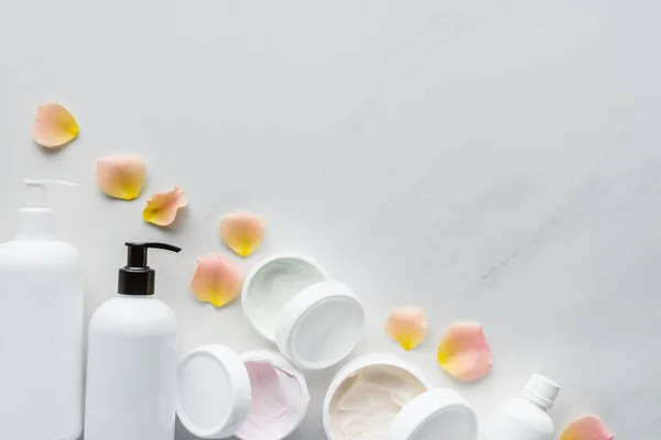 Top View Bottles Cream Rose Petals White Tabletop Beauty Concept — Stock Photo, Image