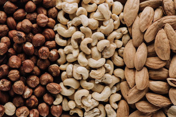 assorted delicious nuts in full screen