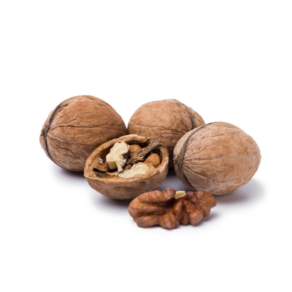 handful of walnuts isolated on white background