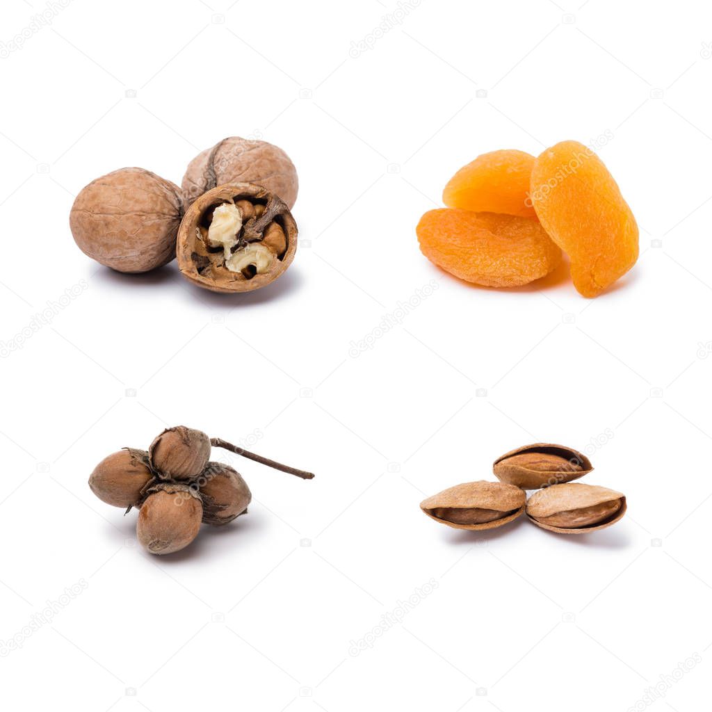 handfuls of assorted nuts and dried apricots isolated on white background