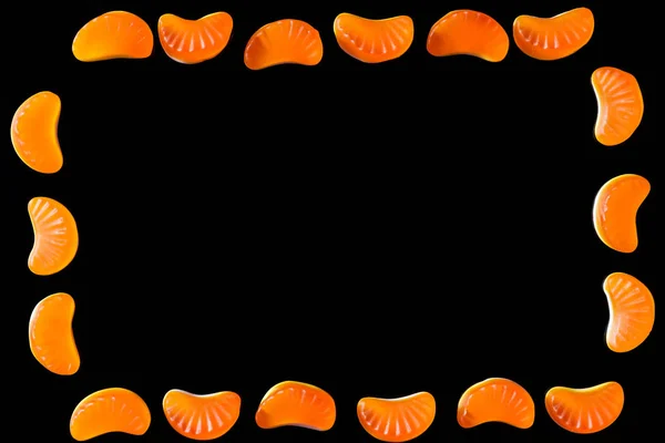 Top View Frame Jelly Candies Shape Tangerine Pieces Isolated Black — Free Stock Photo