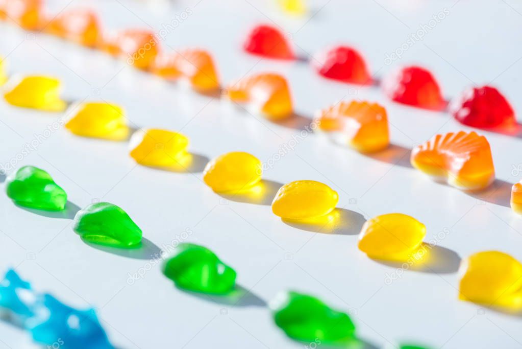 set of sweet colored jelly candies on white