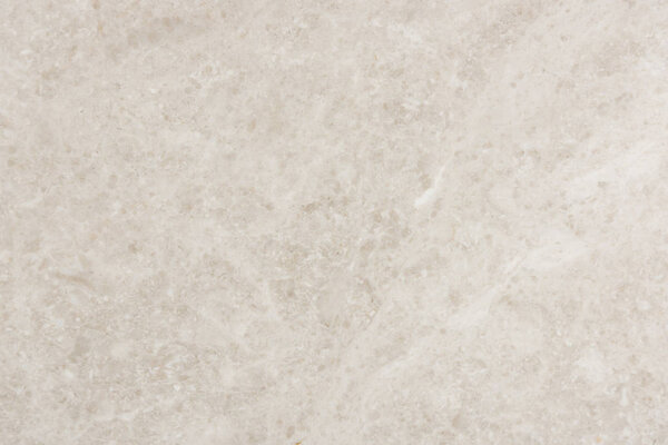 close up of abstract background with light beige marble stone