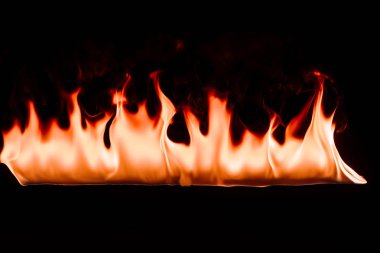 close up view of burning fire on black backdrop clipart