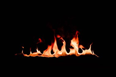 close up view of burning flame on black backdrop clipart