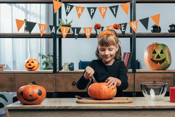 Portrait Smiling Kid Carving Pumpkin Hanging Happy Halloween Flags Home — Stock Photo, Image