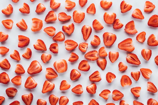 Top View Halved Strawberries White Surface — Free Stock Photo