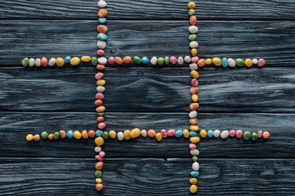 Composizione Caramelle Deliziose Colorate Tavolo Legno — Foto Stock