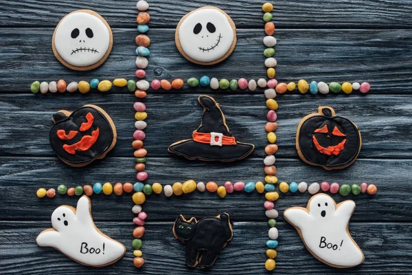 Elevated View Composition Colorful Candies Arranged Halloween Cookies Wooden Table — Stock Photo, Image