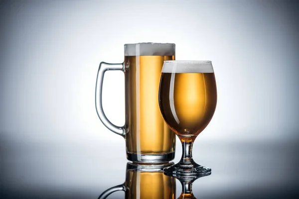 Two Glasses Tasty Beer Reflecting Surface Oktoberfest Concept — Stock Photo, Image