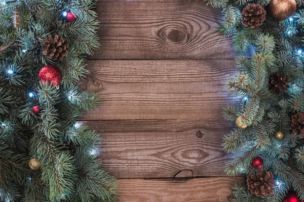 Top View Coniferous Twigs Shiny Baubles Pine Cones Illuminated Garland — Stock Photo, Image