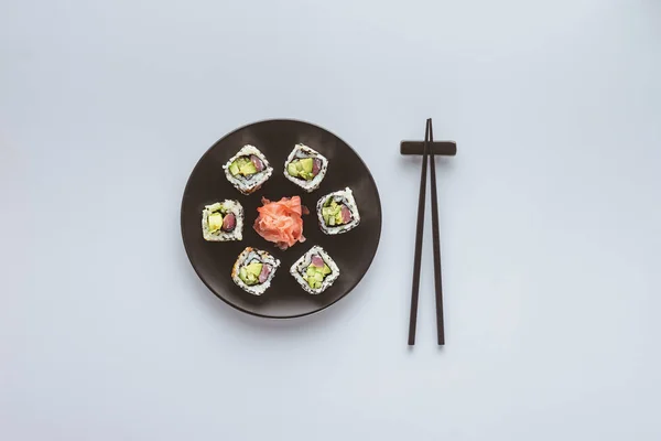 Top View Delicious Sushi Ginger Plate Chopsticks Isolated White — Stock Photo, Image