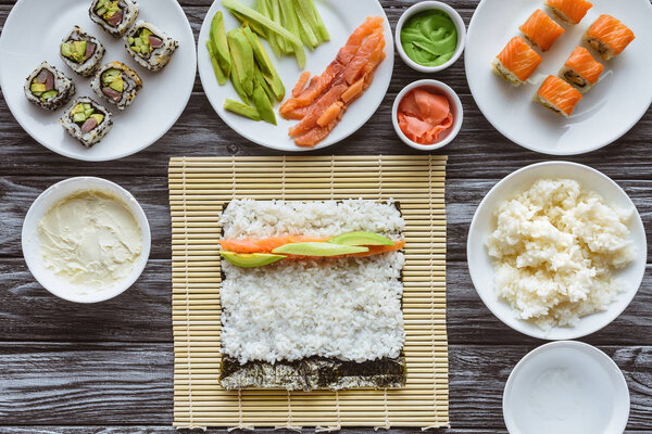 top view of ingredients for cooking delicious sushi on table