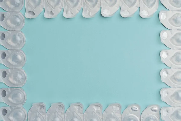 Flat Lay Contact Lenses Containers Arranged Blue Background — Stock Photo, Image