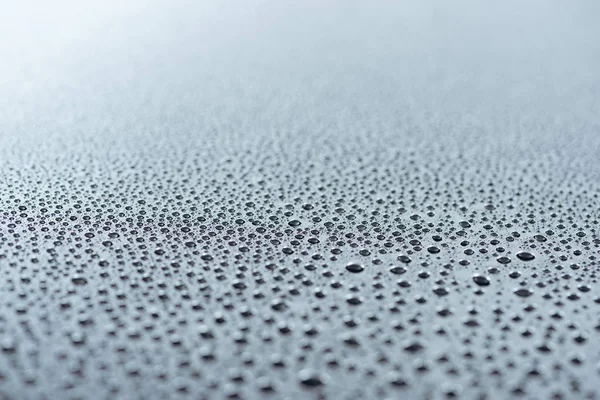 Close View Water Drops Grey Surface Background — Foto Stok Gratis