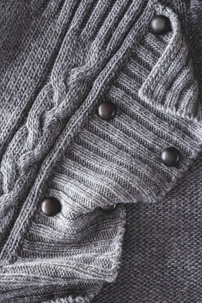 Close View Grey Knitted Cloth Buttons Backdrop — Free Stock Photo