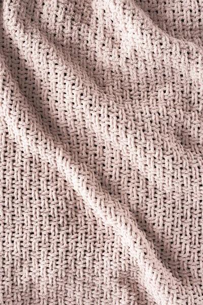 full frame of wavy knitted cloth as background