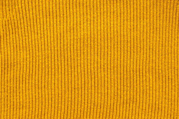 full frame of yellow woolen fabric backdrop