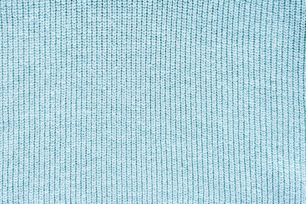 close up view of blue woolen cloth as background