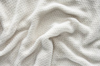 tam çerçeve arka plan olarak dalgalı beyaz örme kumaş
