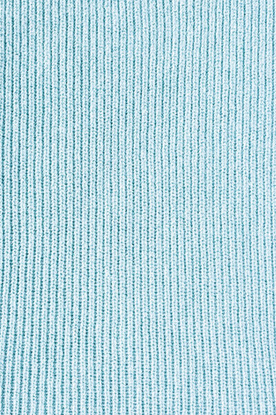 close up view of blue woolen cloth as background