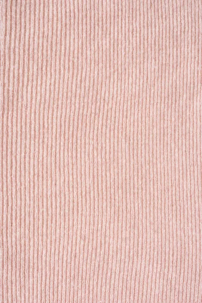 full frame of pink woolen fabric background