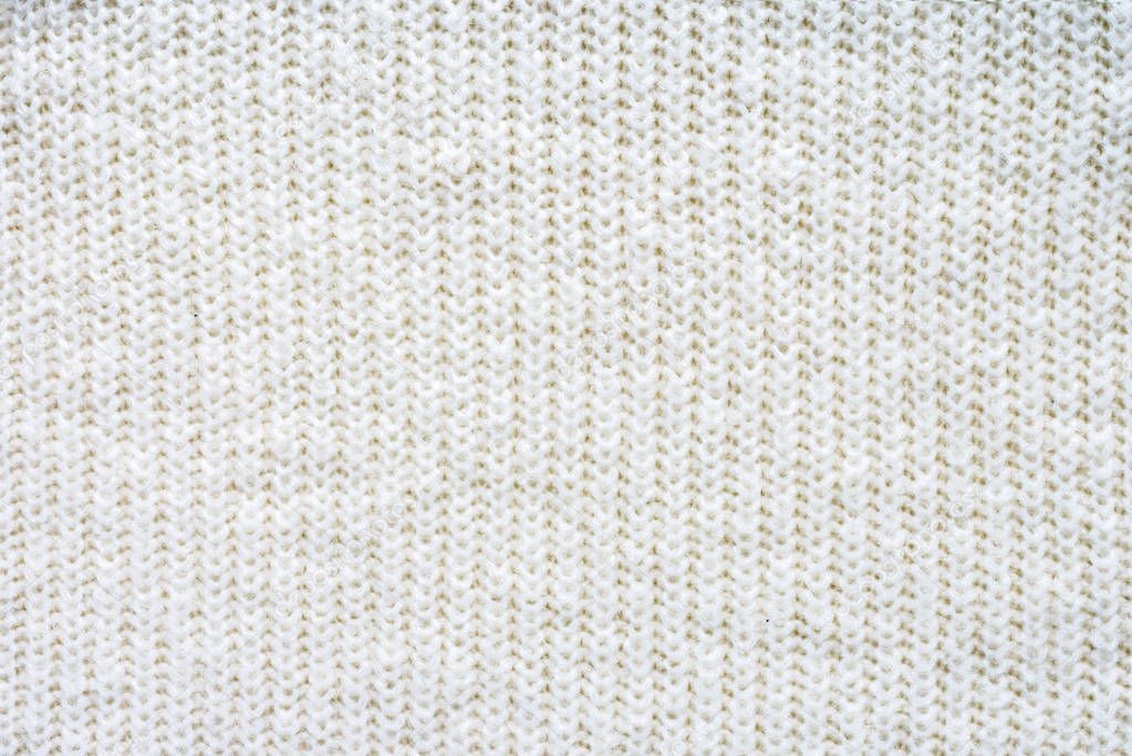 full frame of white woolen fabric background