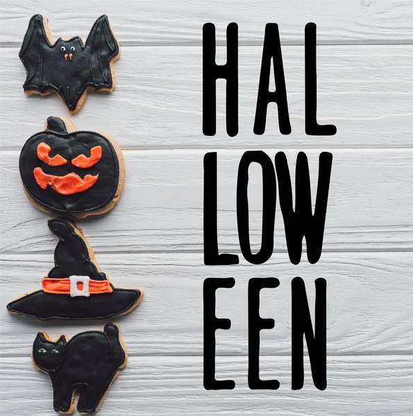 Elevated View Homemade Halloween Cookies Placed Row White Wooden Background — Free Stock Photo