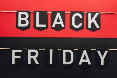 black friday lettering on flag garlands on red and black backgrounds clipart